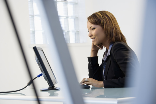 photo of business woman who is ACA Healthcare Reform certified on phone