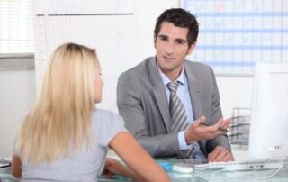 Manager talking to office troublemaker