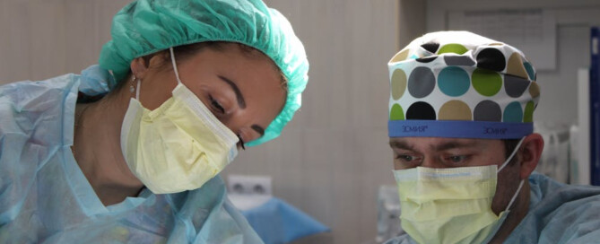 Two doctors busy in an operation