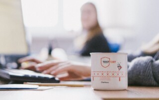 A Cup Branded with Company Name