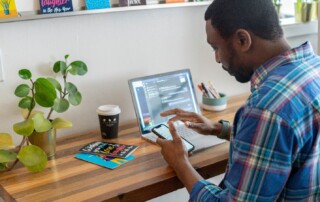 A Man Checking His Phone during Work