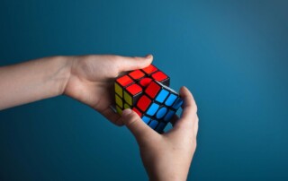 A Man Solving Rubik’s Cube
