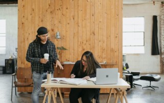 A Manager Overseeing a Team Member’s Work