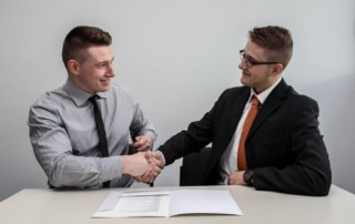 HR Person Welcoming New Hire