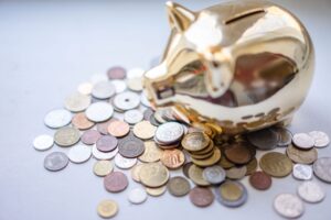 Gold piggy bank representing HSA savings and the triple tax advantage of tax-free contributions, growth, and healthcare withdrawals.