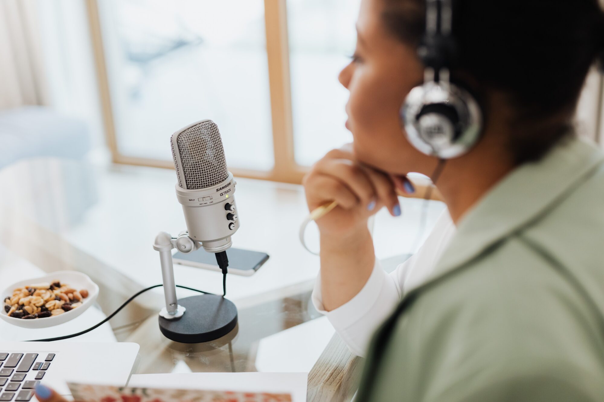 Professional podcaster creating educational content and thought leadership through podcasting and digital media